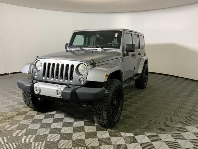 used 2014 Jeep Wrangler Unlimited car, priced at $13,372