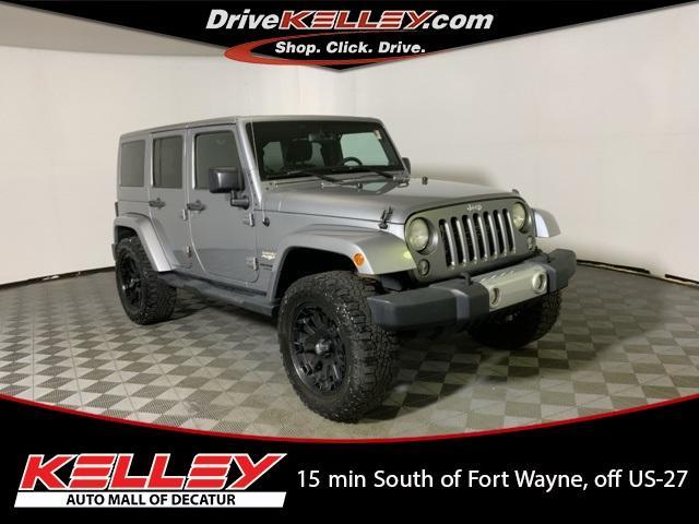 used 2014 Jeep Wrangler Unlimited car, priced at $13,372