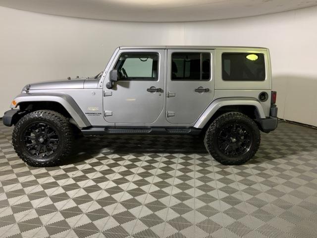 used 2014 Jeep Wrangler Unlimited car, priced at $13,372
