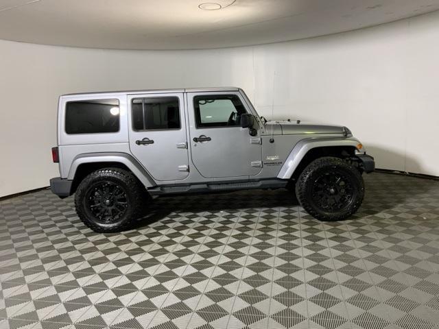 used 2014 Jeep Wrangler Unlimited car, priced at $13,372