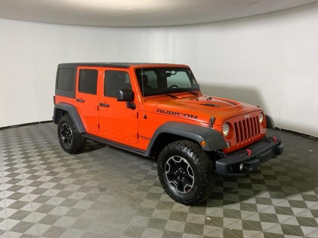 used 2015 Jeep Wrangler Unlimited car, priced at $16,814