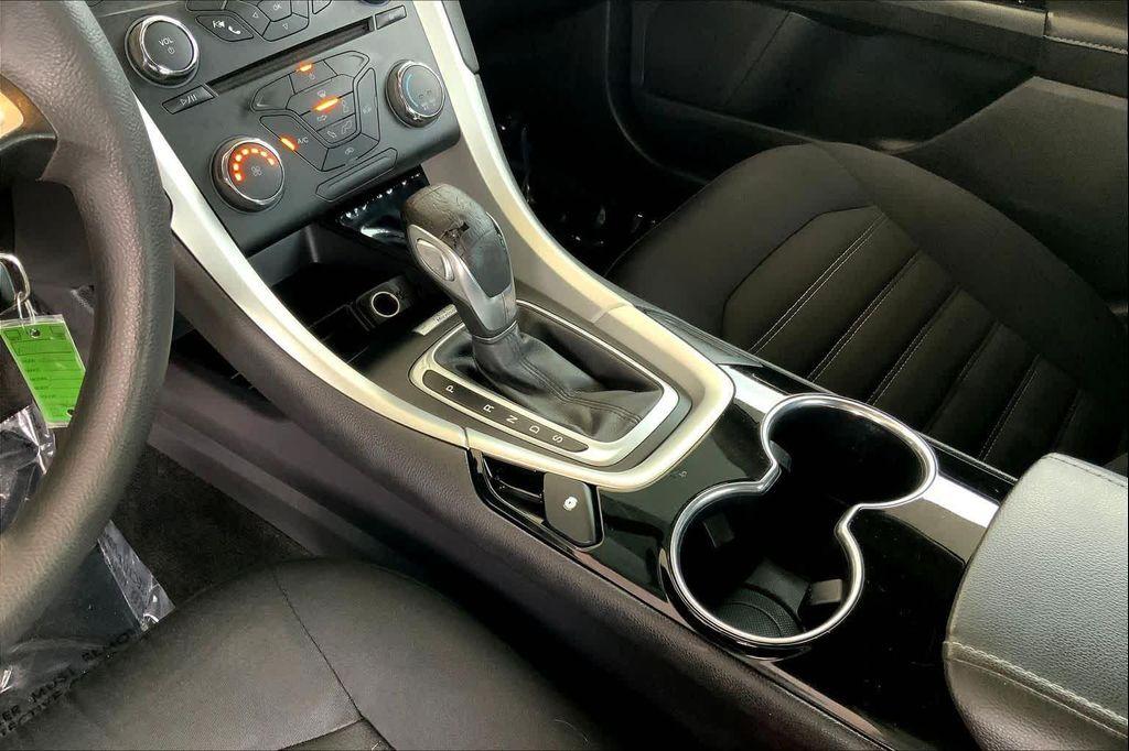 used 2015 Ford Fusion car, priced at $8,999