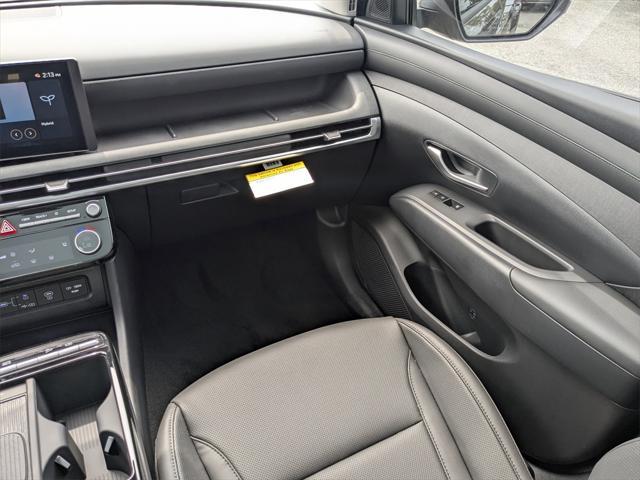 new 2025 Hyundai TUCSON Hybrid car, priced at $35,421