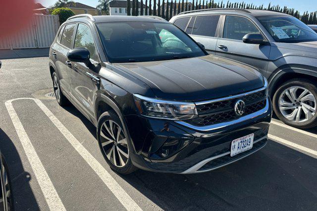used 2024 Volkswagen Taos car, priced at $23,398