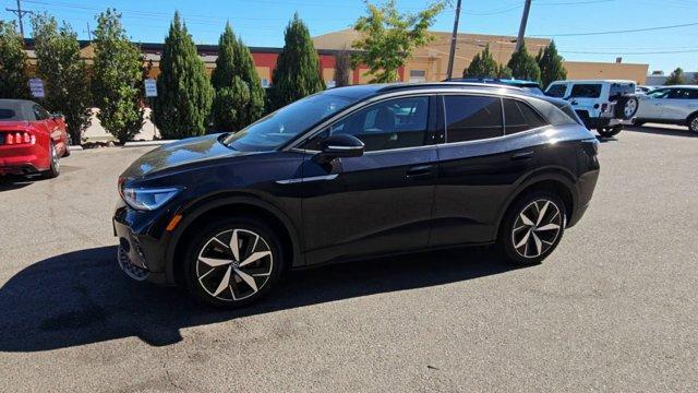 used 2023 Volkswagen ID.4 car, priced at $25,899