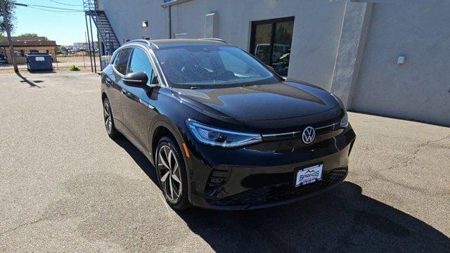 used 2023 Volkswagen ID.4 car, priced at $25,899