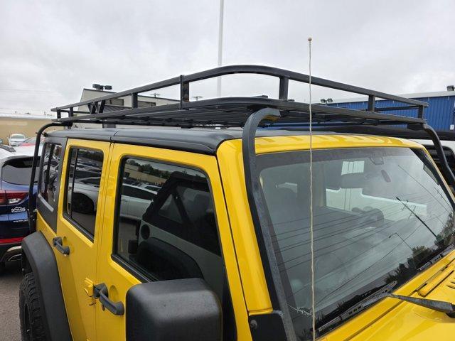 used 2011 Jeep Wrangler Unlimited car, priced at $17,999
