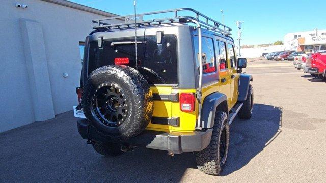 used 2011 Jeep Wrangler Unlimited car, priced at $16,997