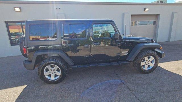 used 2012 Jeep Wrangler Unlimited car, priced at $13,899