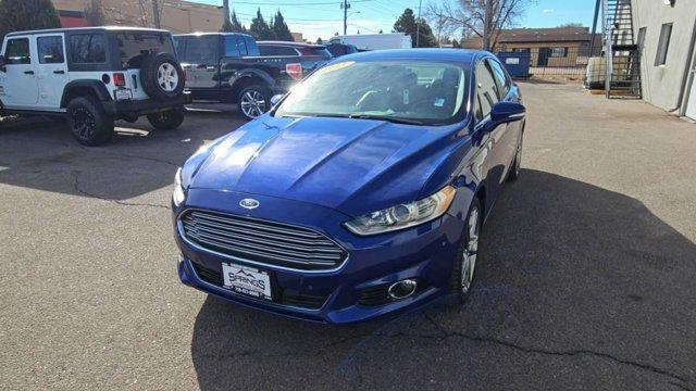 used 2015 Ford Fusion car, priced at $10,099