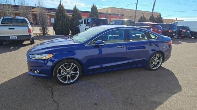 used 2015 Ford Fusion car, priced at $10,099