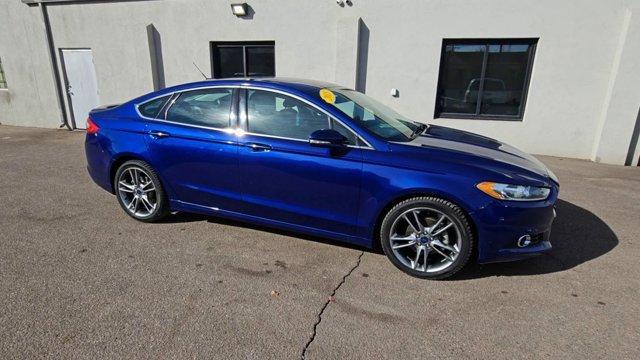 used 2015 Ford Fusion car, priced at $10,099