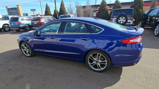 used 2015 Ford Fusion car, priced at $10,099