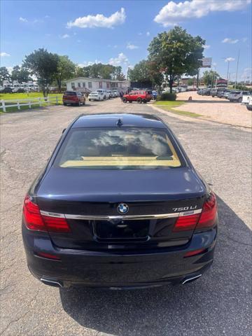 used 2015 BMW 750 car, priced at $15,999