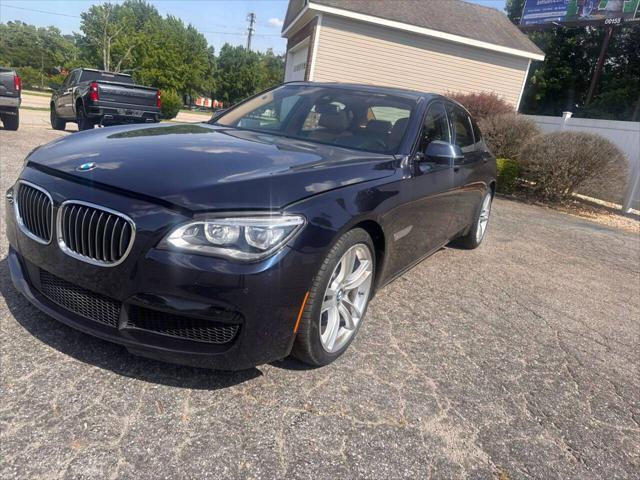 used 2015 BMW 750 car, priced at $15,999