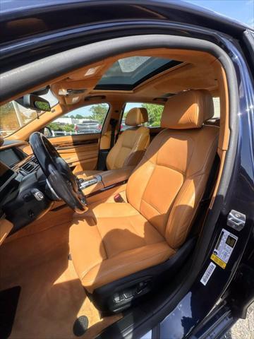used 2015 BMW 750 car, priced at $15,999