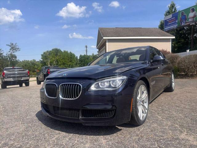 used 2015 BMW 750 car, priced at $15,999