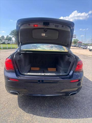 used 2015 BMW 750 car, priced at $15,999