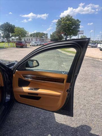 used 2015 BMW 750 car, priced at $15,999