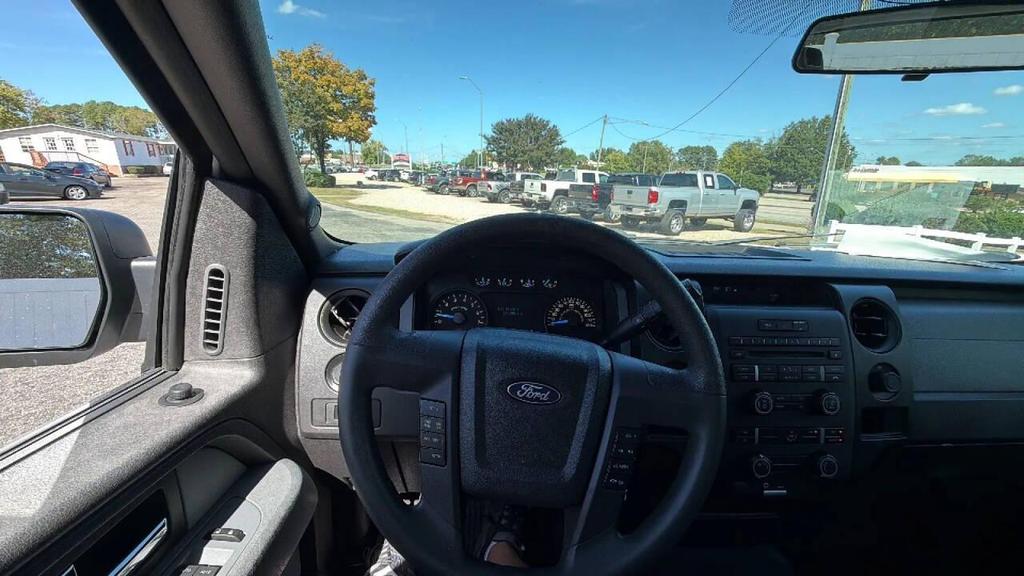 used 2014 Ford F-150 car, priced at $6,499