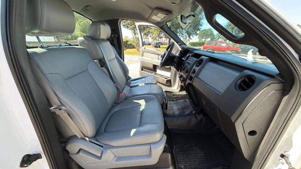 used 2014 Ford F-150 car, priced at $6,499