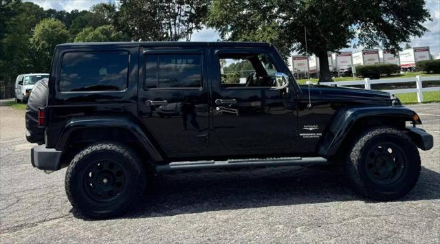 used 2013 Jeep Wrangler Unlimited car, priced at $13,999