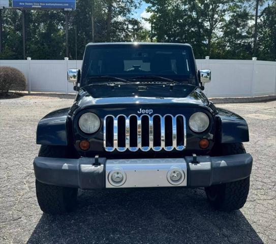 used 2013 Jeep Wrangler Unlimited car, priced at $13,999