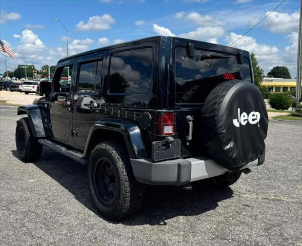 used 2013 Jeep Wrangler Unlimited car, priced at $13,999