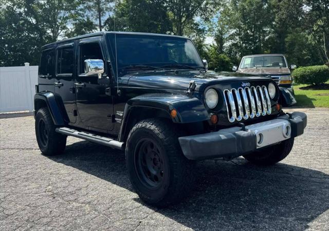 used 2013 Jeep Wrangler Unlimited car, priced at $13,999