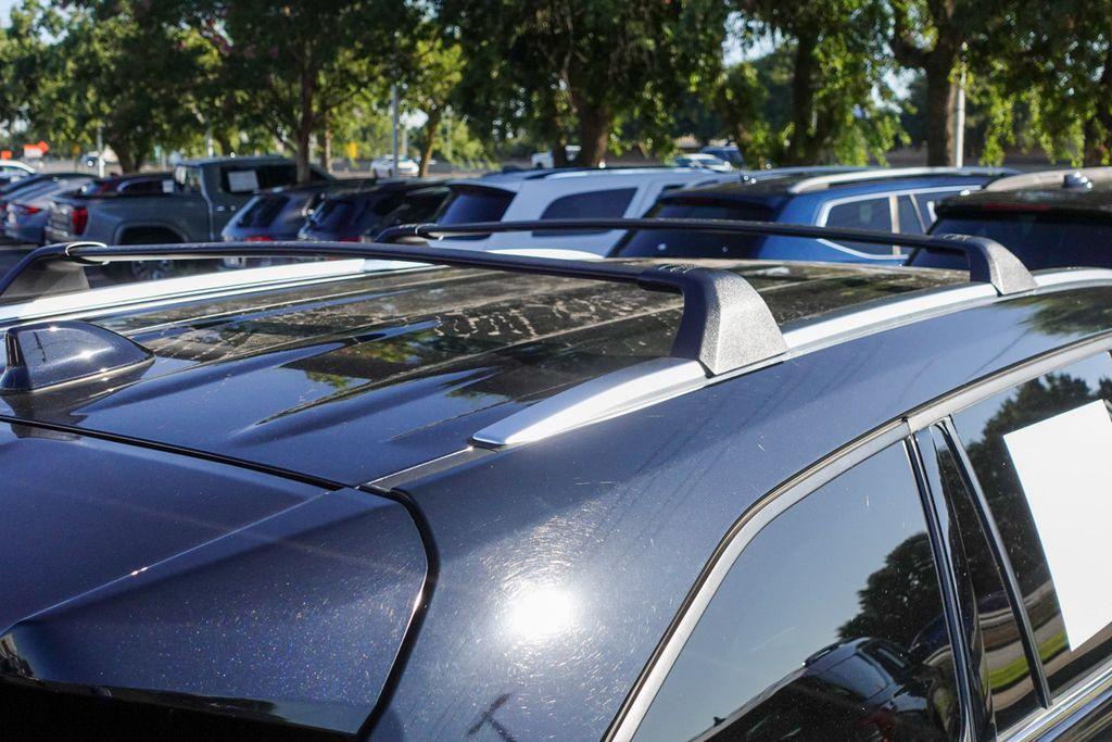 used 2023 Toyota Highlander Hybrid car, priced at $43,877