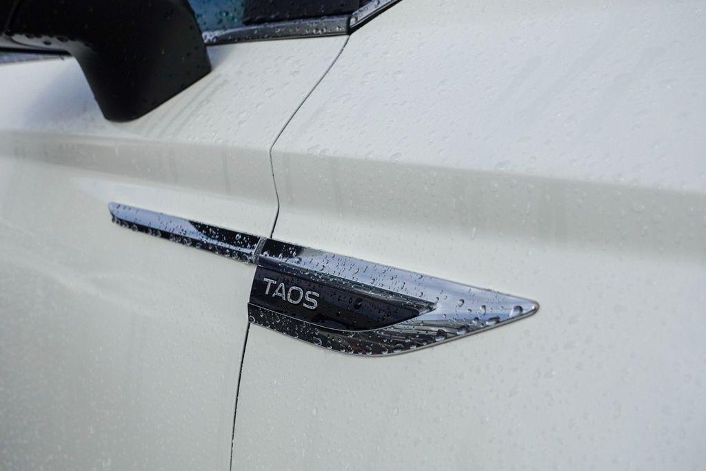 used 2023 Volkswagen Taos car, priced at $18,926