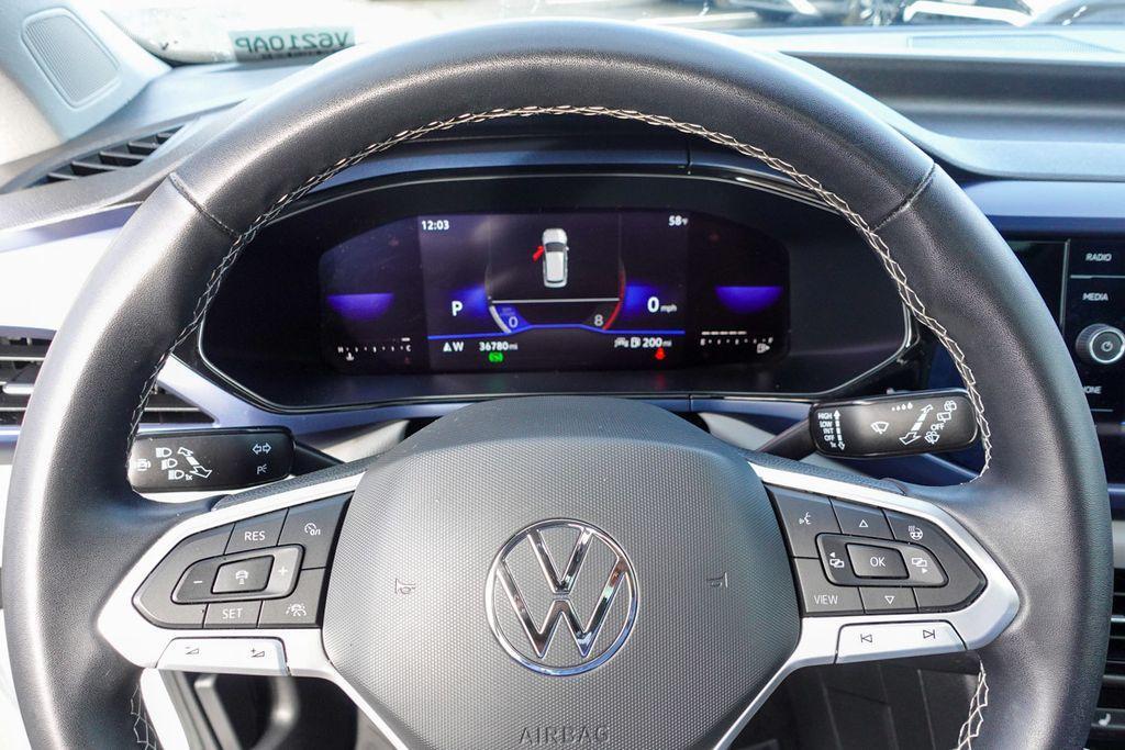 used 2023 Volkswagen Taos car, priced at $18,926
