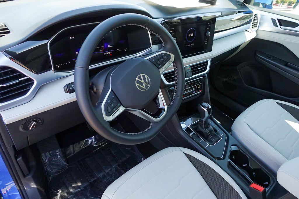 new 2025 Volkswagen Taos car, priced at $30,093