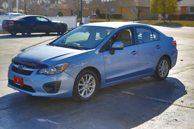 used 2012 Subaru Impreza car, priced at $10,000