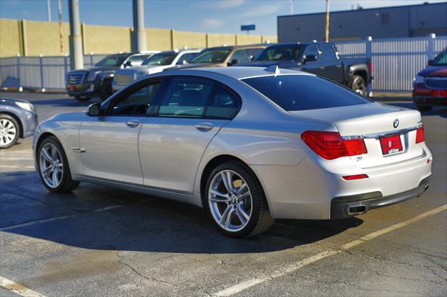 used 2012 BMW 740 car, priced at $10,000