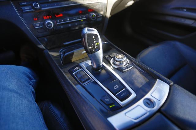 used 2012 BMW 740 car, priced at $10,000