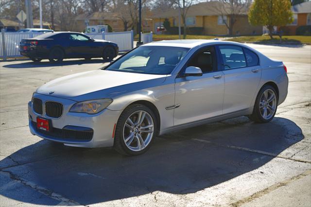 used 2012 BMW 740 car, priced at $10,000