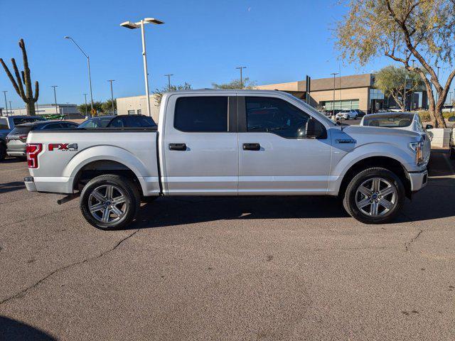 used 2019 Ford F-150 car, priced at $27,412