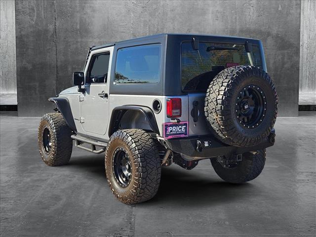 used 2015 Jeep Wrangler car, priced at $23,995