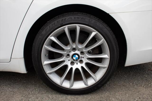 used 2014 BMW 750 car, priced at $15,990