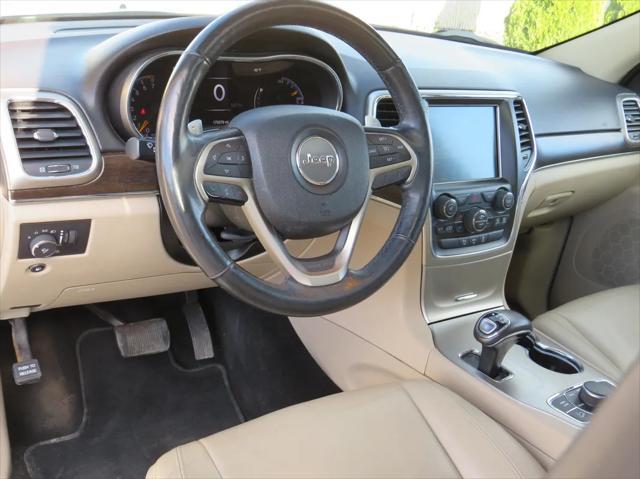 used 2014 Jeep Grand Cherokee car, priced at $7,495