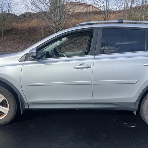 used 2013 Toyota RAV4 car, priced at $9,995