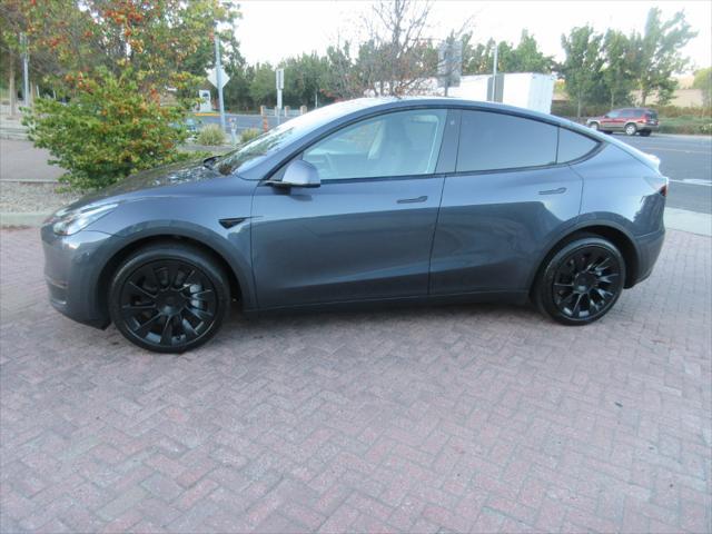 used 2023 Tesla Model Y car, priced at $36,995