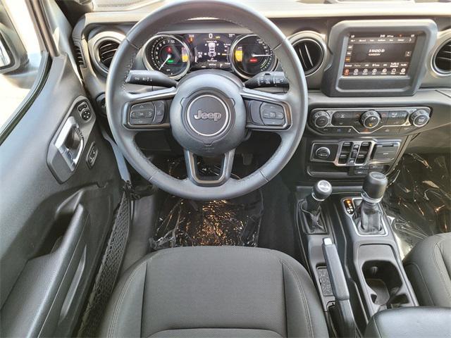 used 2023 Jeep Wrangler 4xe car, priced at $28,788