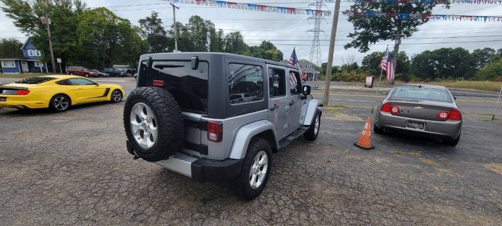 used 2013 Jeep Wrangler Unlimited car, priced at $16,995