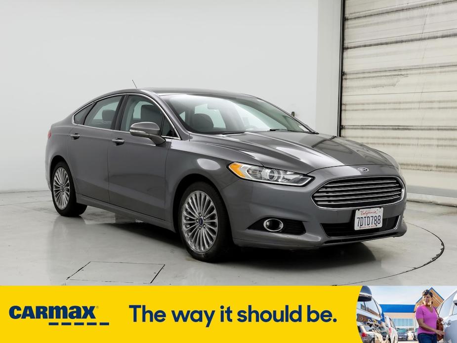 used 2014 Ford Fusion car, priced at $13,998