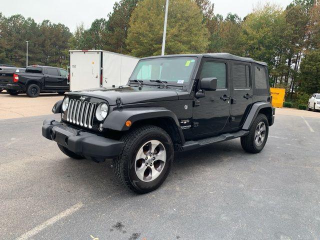 used 2016 Jeep Wrangler Unlimited car, priced at $18,655