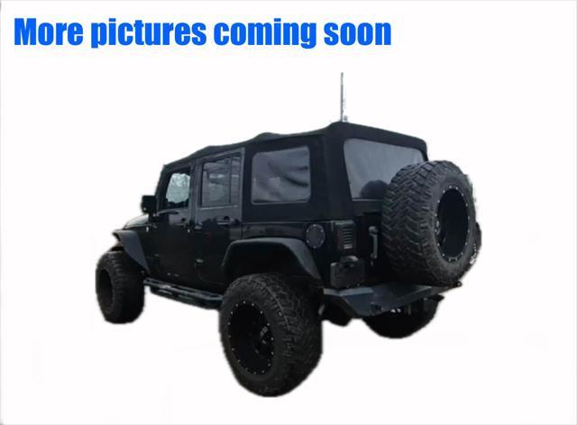 used 2014 Jeep Wrangler Unlimited car, priced at $19,477