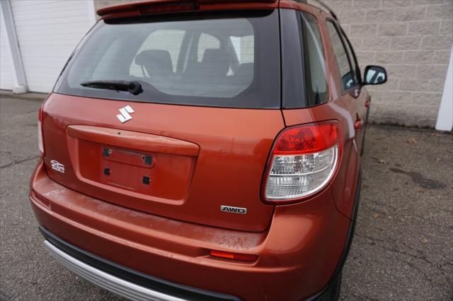 used 2009 Suzuki SX4 car, priced at $5,477