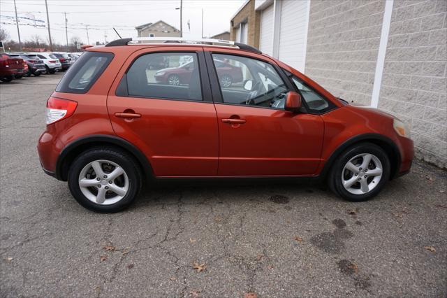 used 2009 Suzuki SX4 car, priced at $5,477